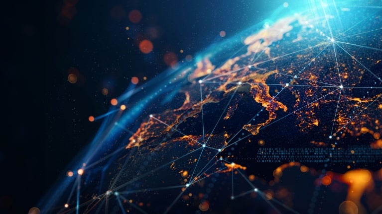 A digital globe illustration featuring illuminated continents connected by glowing lines and abstract data visuals against