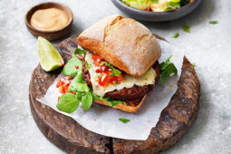 Mexican veggie burger served with salad