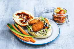 garden gourmet vegan nugget burger on plate with vegetables