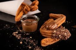 KitKat Churros dipped in chocolate sauce