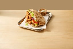 Pulled Filet Pita Kebab with crispy salad and tzatziki